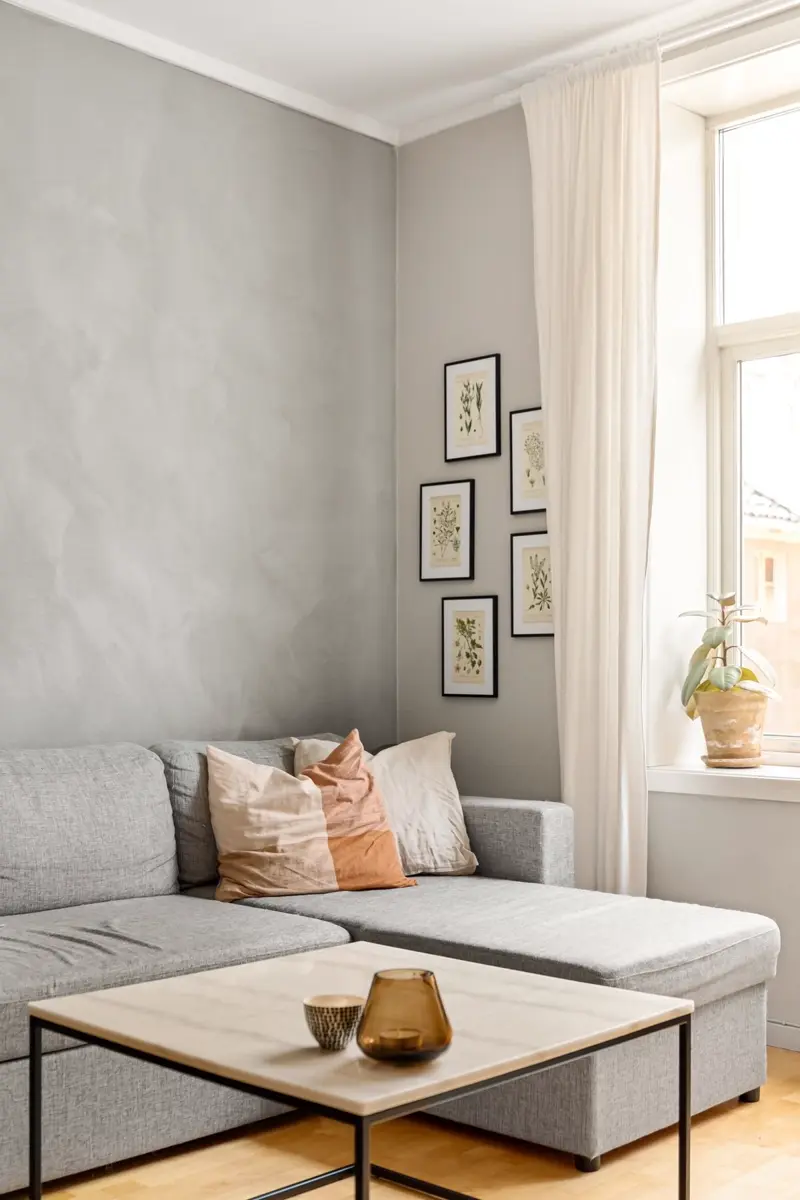 Fixed fabric sofa in a light retail-style living room setting
